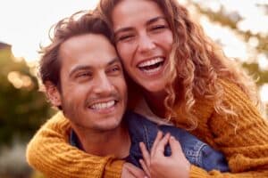 A middle age couple laughing and enjoying their romantic getaway in wisconsin