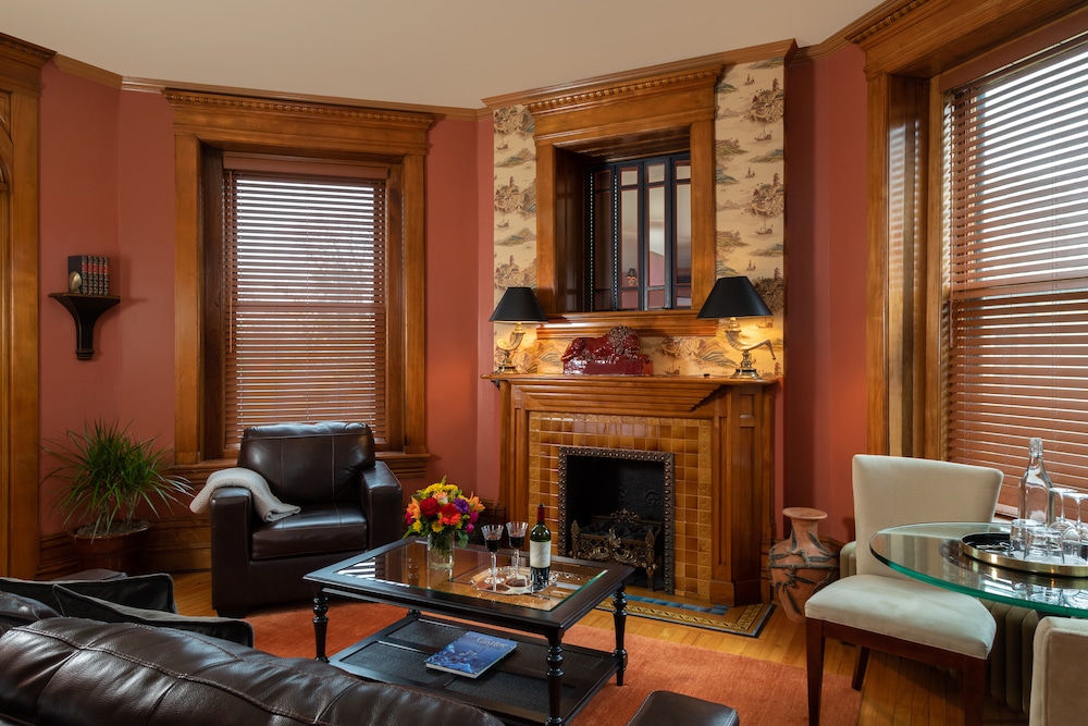 Seating in front of the fireplace in a guest room at our romantic Bed and Breakfast in Wisconsin